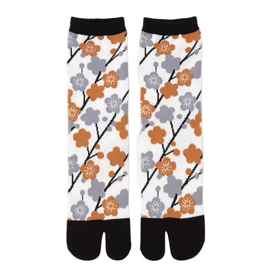 Pair of socks with floral pattern on a white background