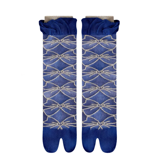 Pair of blue socks with a geometric pattern on a light gray background