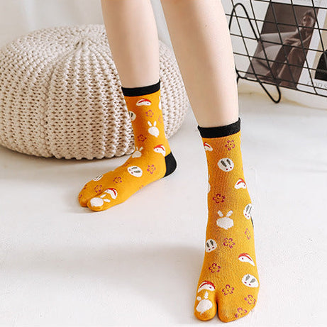 pairs of socks with floral patterns worn by people on a white background.