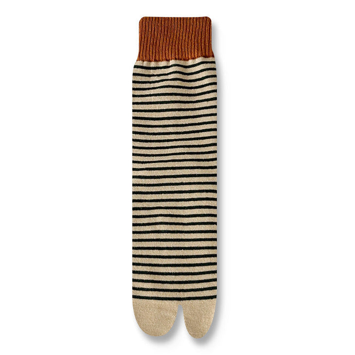 Striped socks with brown top on a white background