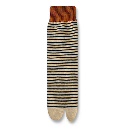 Striped socks with brown top on a white background