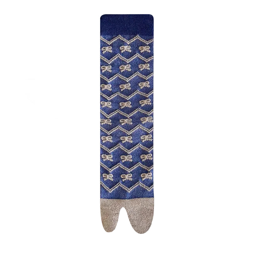 Blue sock with gold bow pattern 