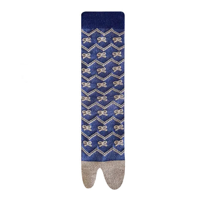 Blue sock with gold bow pattern 